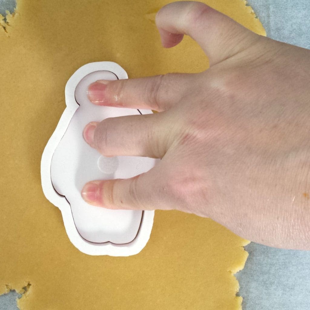 4. Insert stamper and press into dough